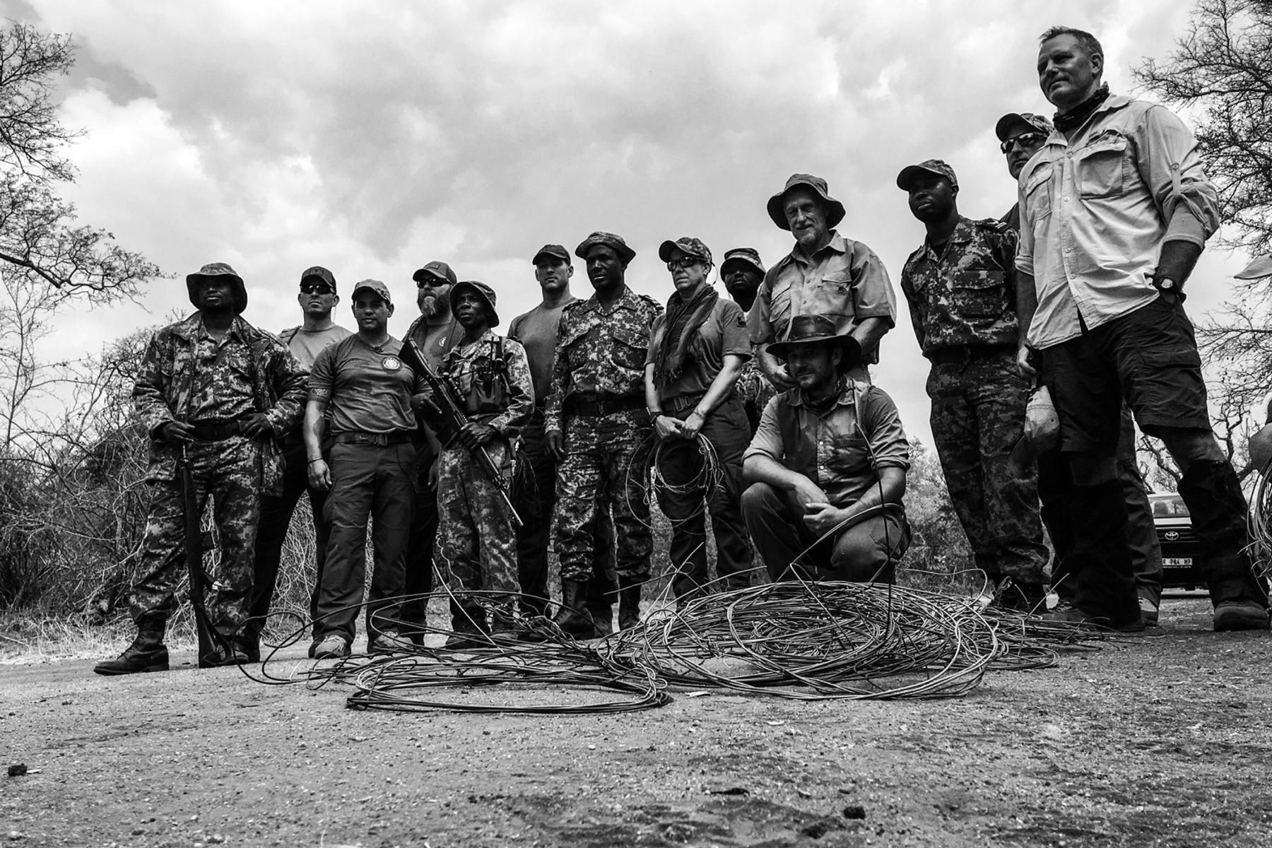 Anti-poaching rangers, black and white